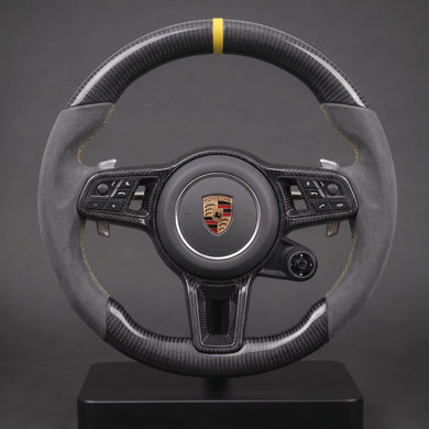 Volant carbone sur mesure Porsche en Alcantara gris avec point jaune à 12 heures, carbone sergé et palettes, base OEM d'origine