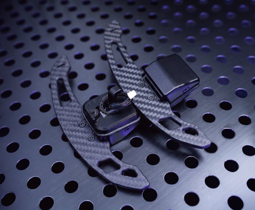 Magnetic steering wheel paddles in perforated twill carbon for Skoda, overview
